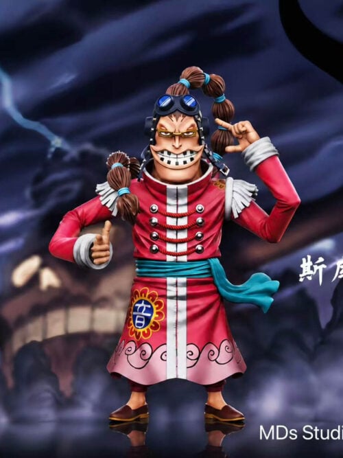Scratchmen Apoo in a red coat and turquoise sash, grinning with one hand raised beside his headphones, shown without the optional DJ base.