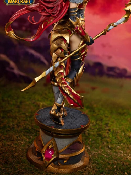 Detail of Alexstrasza's layered gold leg armor, pointed staff end and circular pedestal with a red-purple jewel ornament.