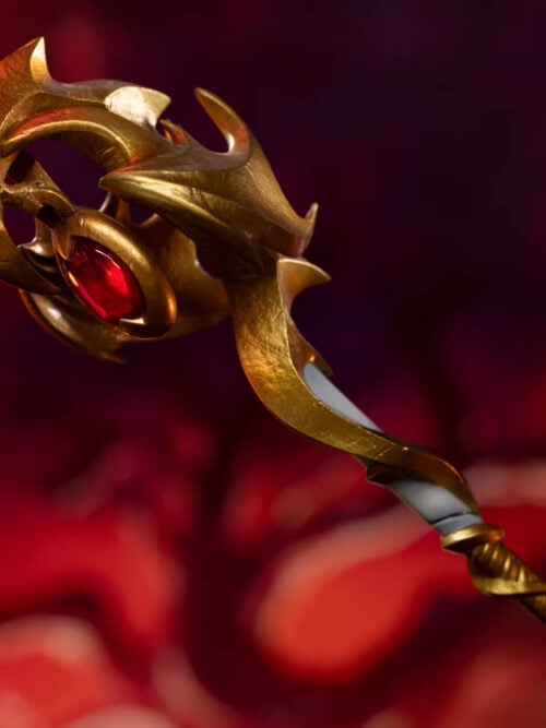 Close-up of Alexstrasza's gold dragon-headed staff with a red jewel-like inset and a spiraling gold-and-gray shaft.