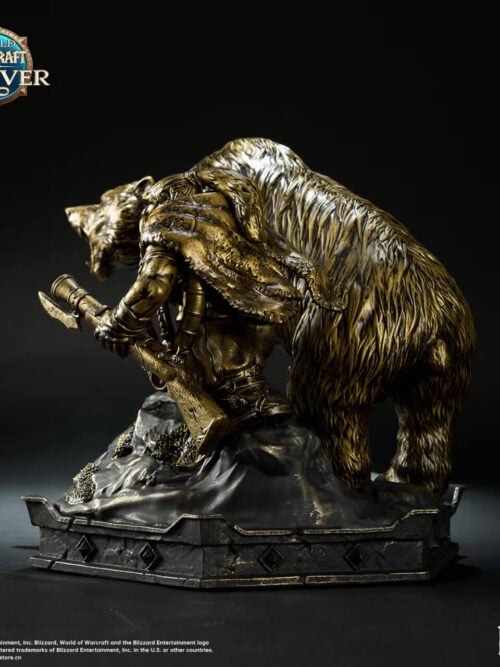 Rear three-quarter view of the dwarf hunter and bear statue, showing the hunter's rifle, shoulder covering and the bear's fur.