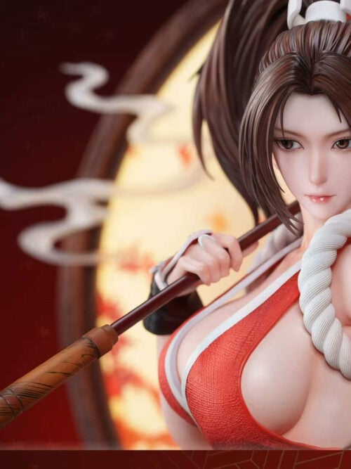 Close-up of Mai Shiranui's face, brown hair and white shoulder rope, with her hand gripping the parasol shaft.