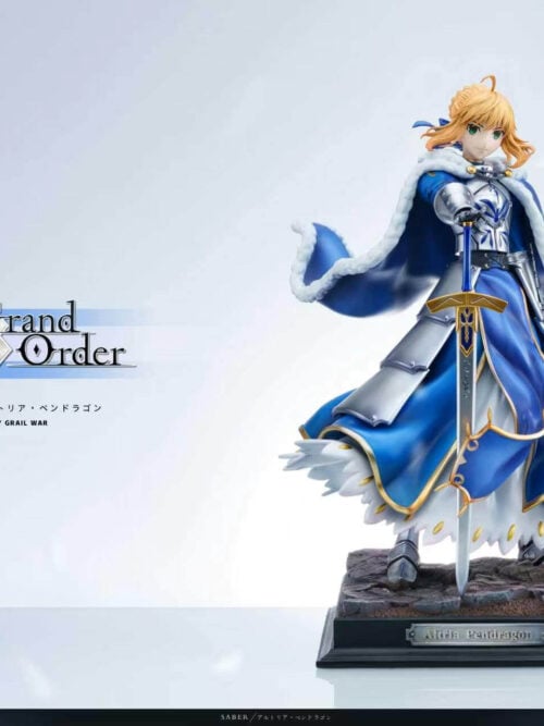 Full Altria Pendragon statue with sword and rectangular display base, positioned beside a large Fate/Grand Order logo.