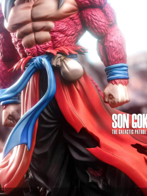 Detail of Son Goku's blue waist sash, small pouch, clenched fists, curling red tail and torn red clothing panels.