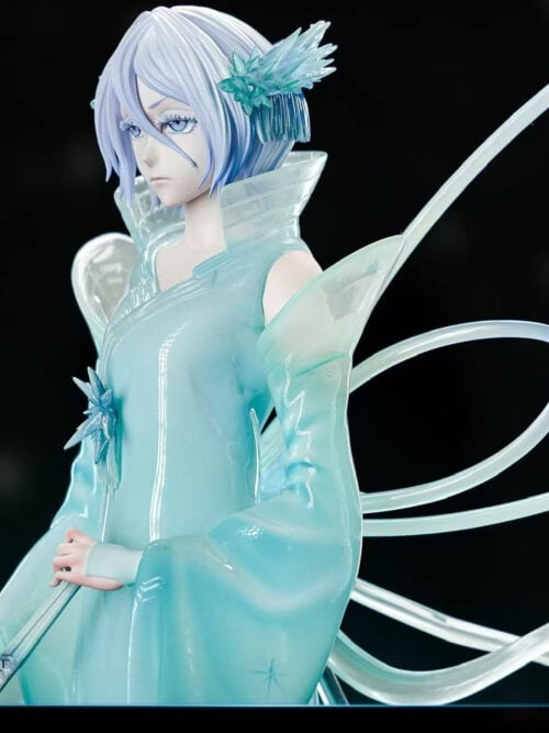 Angled close-up of Kuchiki Rukia with a crystalline blue hair ornament, raised collar, long sleeve and looping translucent ribbons.