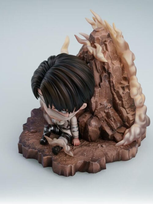 Elevated view of chibi Levi Ackerman seated at the foot of a jagged rock backdrop, with scattered stones and smoke effects around the base.