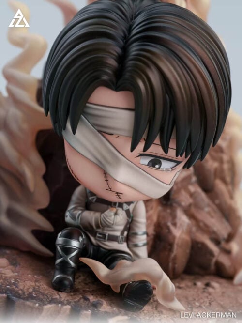 Angled close-up of chibi Levi Ackerman with a tear beneath his visible eye, diagonal facial bandages and a wrapped fist held to his chest.