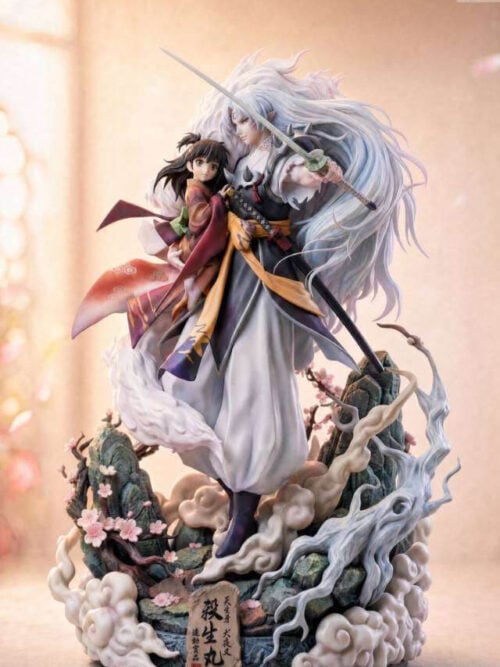 Angled view of Sesshomaru holding Rin, with his sword crossing diagonally in front of his flowing hair and a pale tree beside the base.