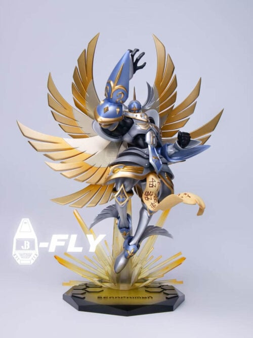 Full front view of Seraphimon with spread gold-and-silver wings, a curling inscribed sash and amber effects above a dark faceted base.