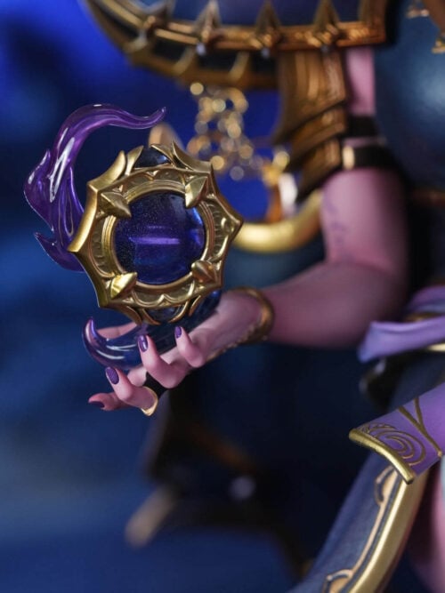 Close-up of the gold-framed purple orb above Xal'atath's open hand, with curling translucent effects around it.