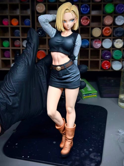 Alternate front view of LP Studio's Android 18 figure, with a blonde bob, one hand behind her head and one knee bent inward.