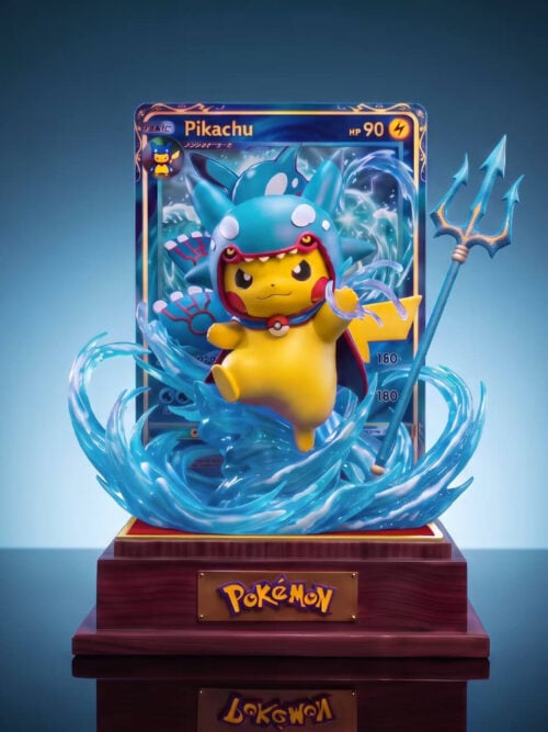 Front view of Kyogre Costume Pikachu in a blue hood and cape, surrounded by curling waves beside a trident, card backdrop and nameplate base.