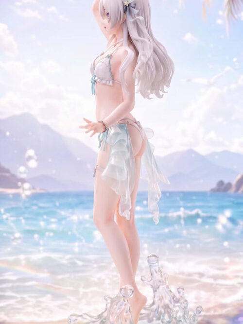 Left-facing side view of Firefly showing layered silver hair, trailing aqua drapes and curling waves around the sandy base.