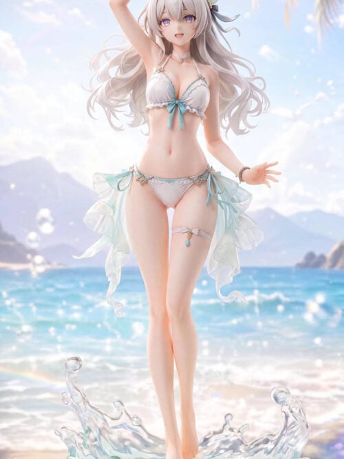 Full front view of Firefly in a white and aqua swimsuit, smiling with one arm raised above a sandy base with curling blue waves.