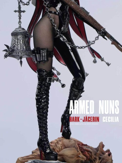 Close-up of Cecilia's lace-up boots, mesh stocking, hanging bell and horned creature on snow-covered rocks.
