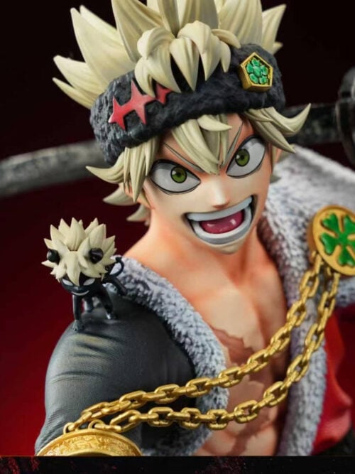 Tight close-up of Asta's green eyes, open grin and black headband, with a small horned companion on his shoulder.