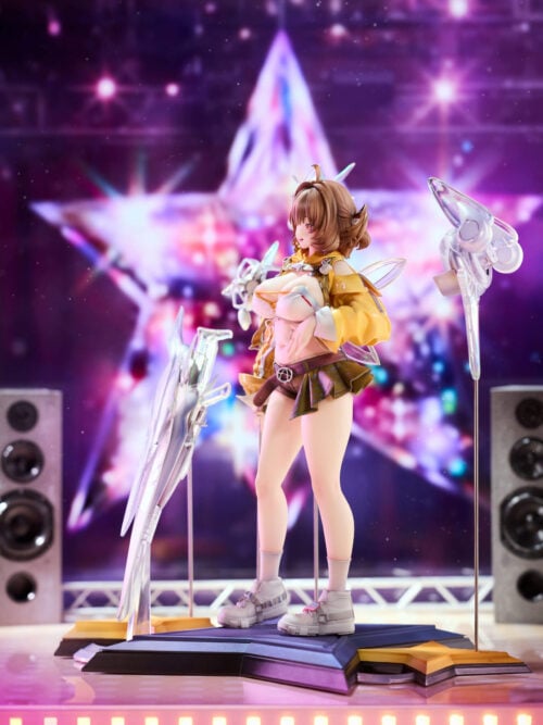 Side view of Anis showing her yellow jacket, patterned hip fabric, white platform sneakers and supported ornaments on a star-shaped base.