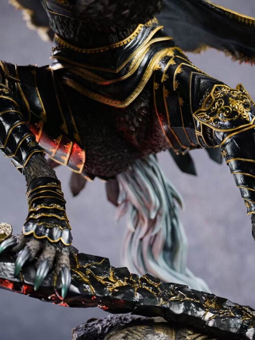 Maliketh's black-and-gold leg armor and clawed feet above the jagged black sword with its gold-colored guard.