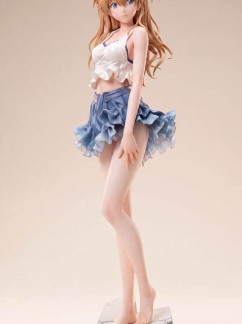 Full front view of Asuka Langley in a blue-trimmed white top and ruffled blue skirt, standing barefoot on an angular EVA-02 base.