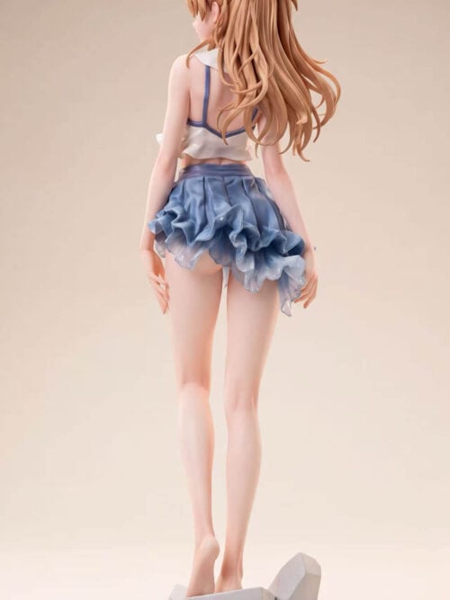 Rear view of Asuka Langley showing long orange hair, blue trim on the white top, layered skirt ruffles and the angular display base.