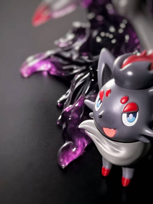 Angled close-up of smiling Zorua on a dark surface beside translucent purple effects and Zoroark's partially visible legs.