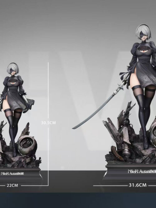 2B dimensions chart comparing the smaller statue labeled 30.5 cm high with the larger statue labeled 43.9 cm high.