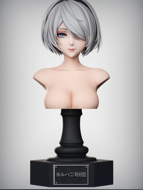 2B's unmasked Deluxe bust on a black pedestal, with a visible blue eye and a notice that the head fits the main figure.