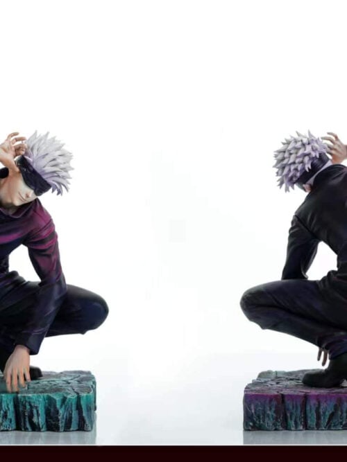 Front and rear views of Firefly Studio's crouching Satoru Gojo figure, with a blindfolded portrait and cracked stone-textured base.