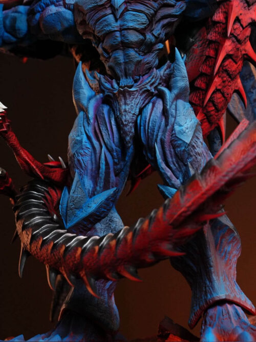 Close-up of Obelisk the Tormentor's blue legs encircled by Slifer the Sky Dragon's segmented red-and-black spiked tail