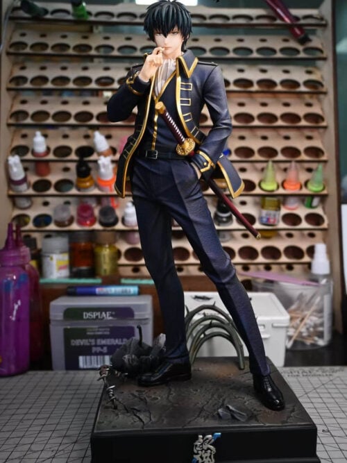 Full-length front view of the WeiMu Studio and Absurd Studio 1/6 scale Toushirou Hijikata statue from Gintama in a gold-trimmed Shinsengumi coat holding a cigarette on a rocky base with thorns and barbed wire