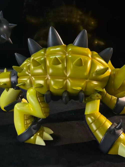 Right side view of LD Studio's Ankylomon figure showing the dark grey studded tail collar, upward-curving segmented tail with its grey spiked mace, yellow dorsal shell, and planted three-clawed feet.