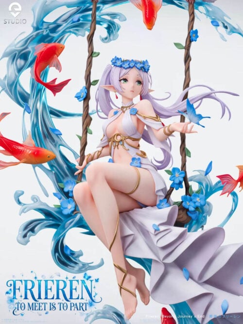 Close-up render of EVE Studio's Frieren - Ocean Wave Elf Swing Ver. statue showing Frieren wearing a blue floral crown and white gold-trimmed dress on a flower-lined swing with a blue butterfly on her left hand.