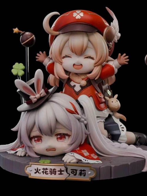Front view of the XingYu Studio Klee and Sparxie chibi statue showing Klee laughing on the back of a teary-eyed Sparxie on a round stone base with floating bombs and a front nameplate.