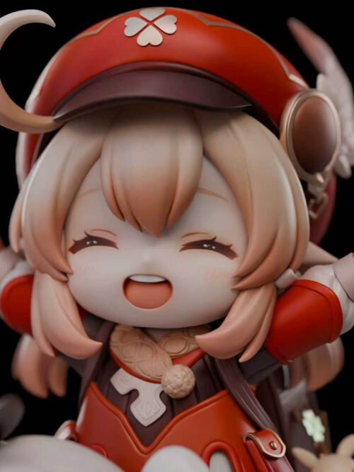 Close-up of Klee laughing with her arms spread wide, wearing her red beret with a white four-leaf clover emblem and side feather.