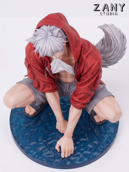 High-angle view of the Zany Studio Cat Satoru Gojo figure crouching with both hands reaching toward the round blue water base, showing the red hood, white animal ears, and bushy tail.