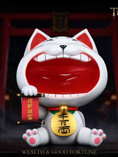 Front view of Stone Custom Studio Turbo Granny maneki-neko entryway display piece with wide open mouth, red scroll, and gold coin against a shrine background.
