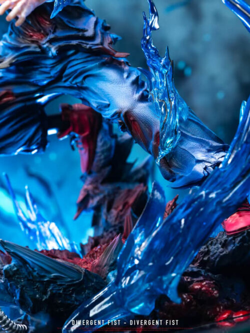 Detail view of the lower body and shattered rubble base with rebar and sharp blue effect parts on the Yuji Itadori statue.