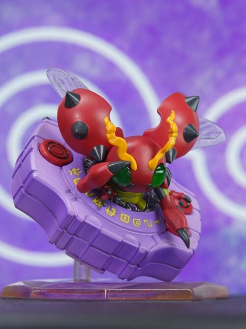 VG Studio Cute Series Tentomon figure emerging from a tilted purple Digivice on a translucent hexagonal base, viewed from a front-left angle with red spiked wing shells and translucent inner wings spread open.