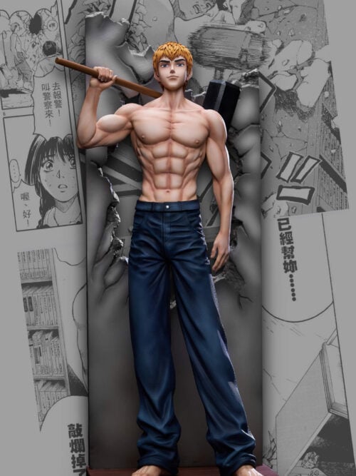 Eikichi Onizuka statue holding a sledgehammer across his shoulders, barefoot in dark blue trousers before a broken wall on a GTO-lettered base.