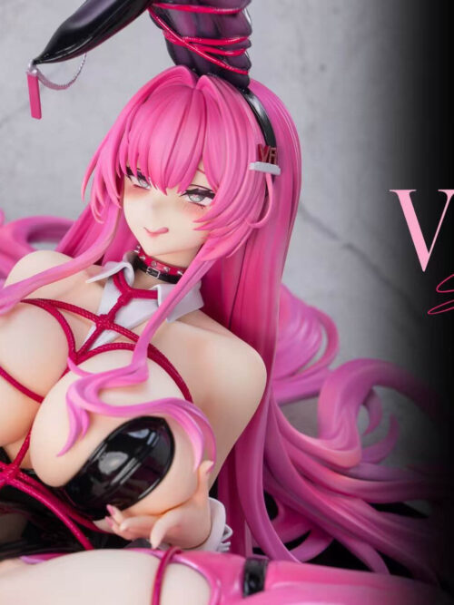 Close-up of the Velvet statue's face, pink bangs, hair clip, white collar and pink cord details.