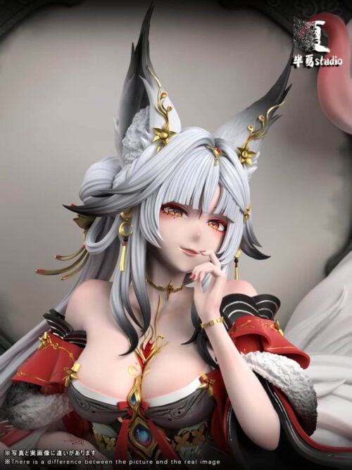 Hsin portrait with silver hair, tall black-tipped ears, gold-colored ornaments and one finger held near her smiling lips.