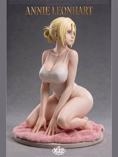 Front three-quarter view of Annie Leonhart kneeling with both hands resting on a pink plush rug over a circular base.