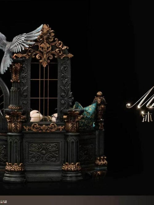 Rear view of Aeolian Mornlight Collector's Version, showing carved architectural panels, gold-toned ornament and the bird's spread wings.