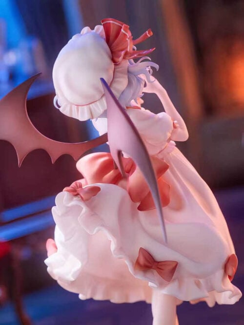 Rear three-quarter detail of Remilia Scarlet showing spread bat-like wings, a frilled bonnet and red bows on her pale dress.
