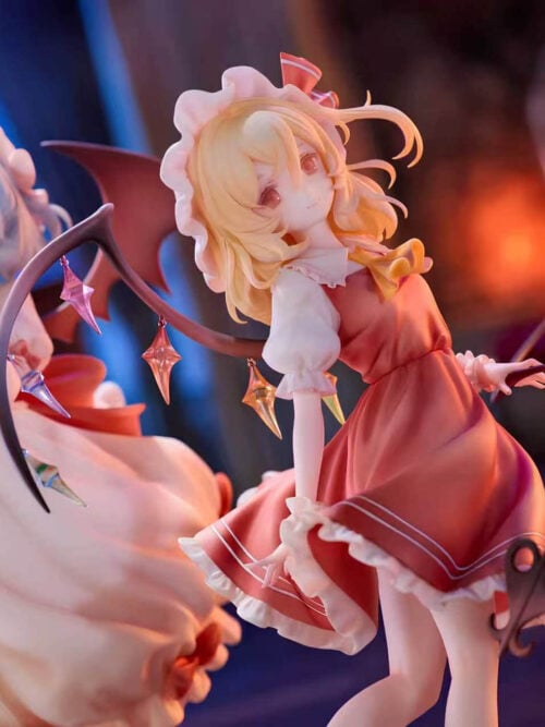 Flandre Scarlet in focus with blonde hair, a red frilled dress and colorful wing ornaments, with Remilia Scarlet behind her.