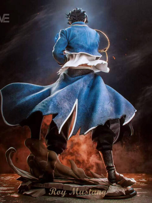 Rear view of Roy Mustang showing the torn white shirt, flared blue coat panels, black boots and sculpted smoke on the broken-paving base.