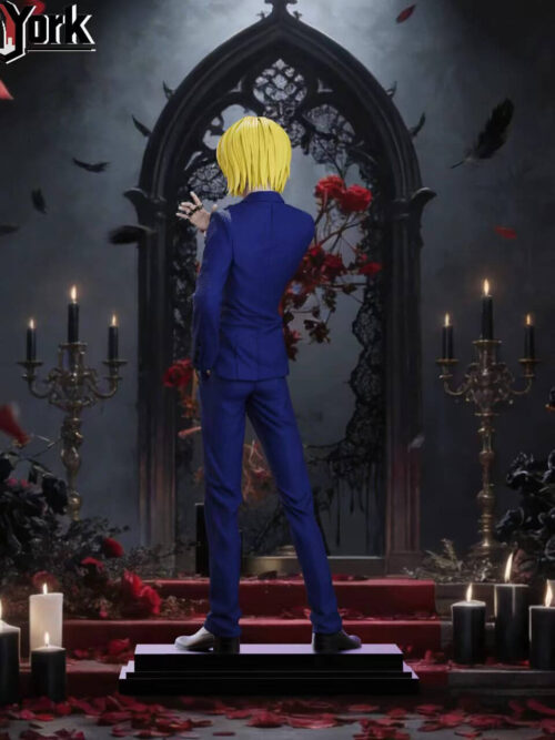 Rear view of Kurapika in the blue suit, showing the jacket seams, blond hair, trousers and shoes on a stepped rectangular base.