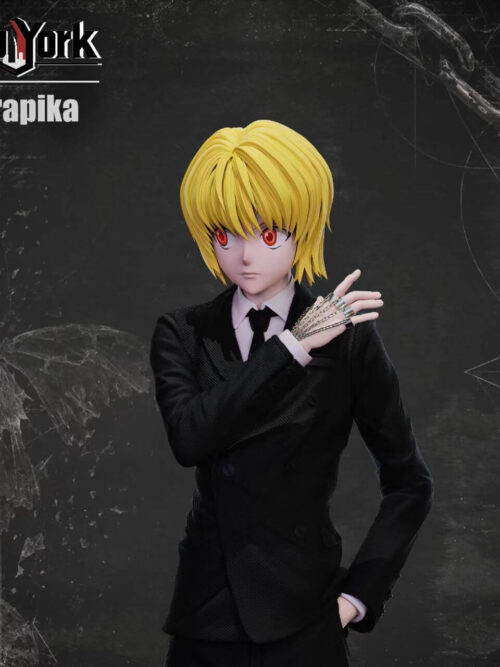 Alternate upper-body angle of Kurapika in a black suit and tie, with his chain-covered hand crossing his chest and his other hand tucked into a pocket.