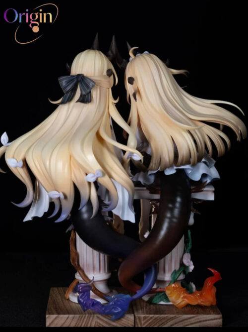 Rear view of Eblana on the left and Reed on the right, showing long blonde hair, curved tails, separate columns and purple-blue and orange flames.