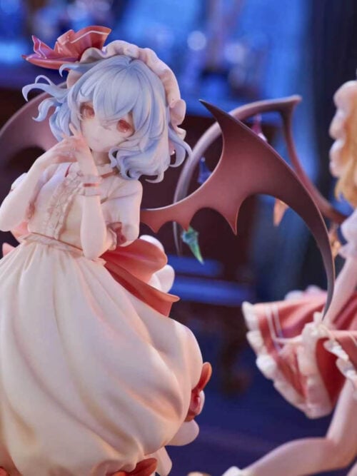 Remilia Scarlet with hands near her face, blue hair and broad bat wings, with Flandre Scarlet softly focused behind her.