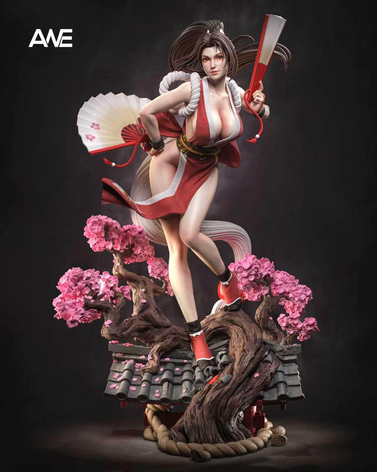 ANE Studio Mai Shiranui - Full Front View Front view of Mai Shiranui holding two fans above pink flowering branches and a gray tiled rooftop base.